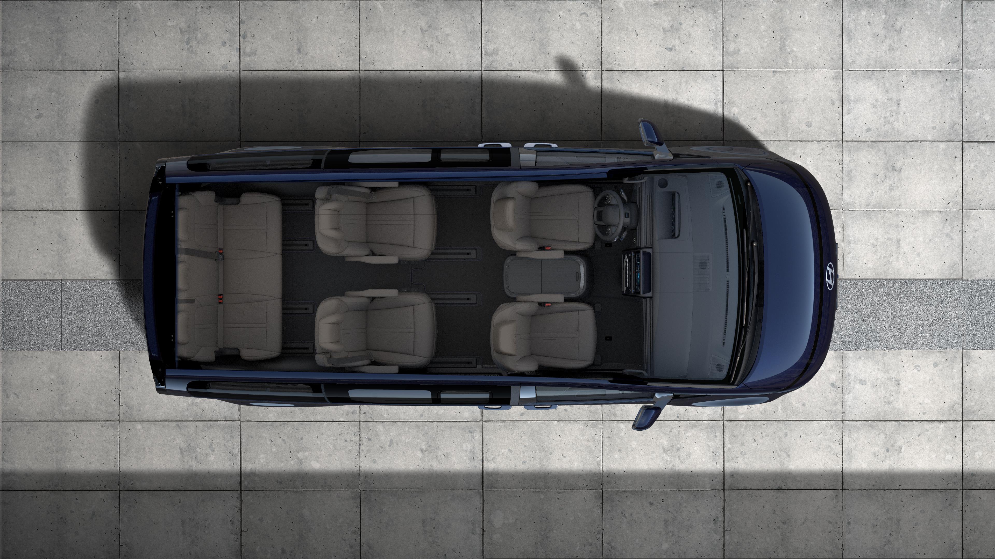 Hyundai STARIA Electric top-down view showing 7-seater layout and spacious interior cabin.