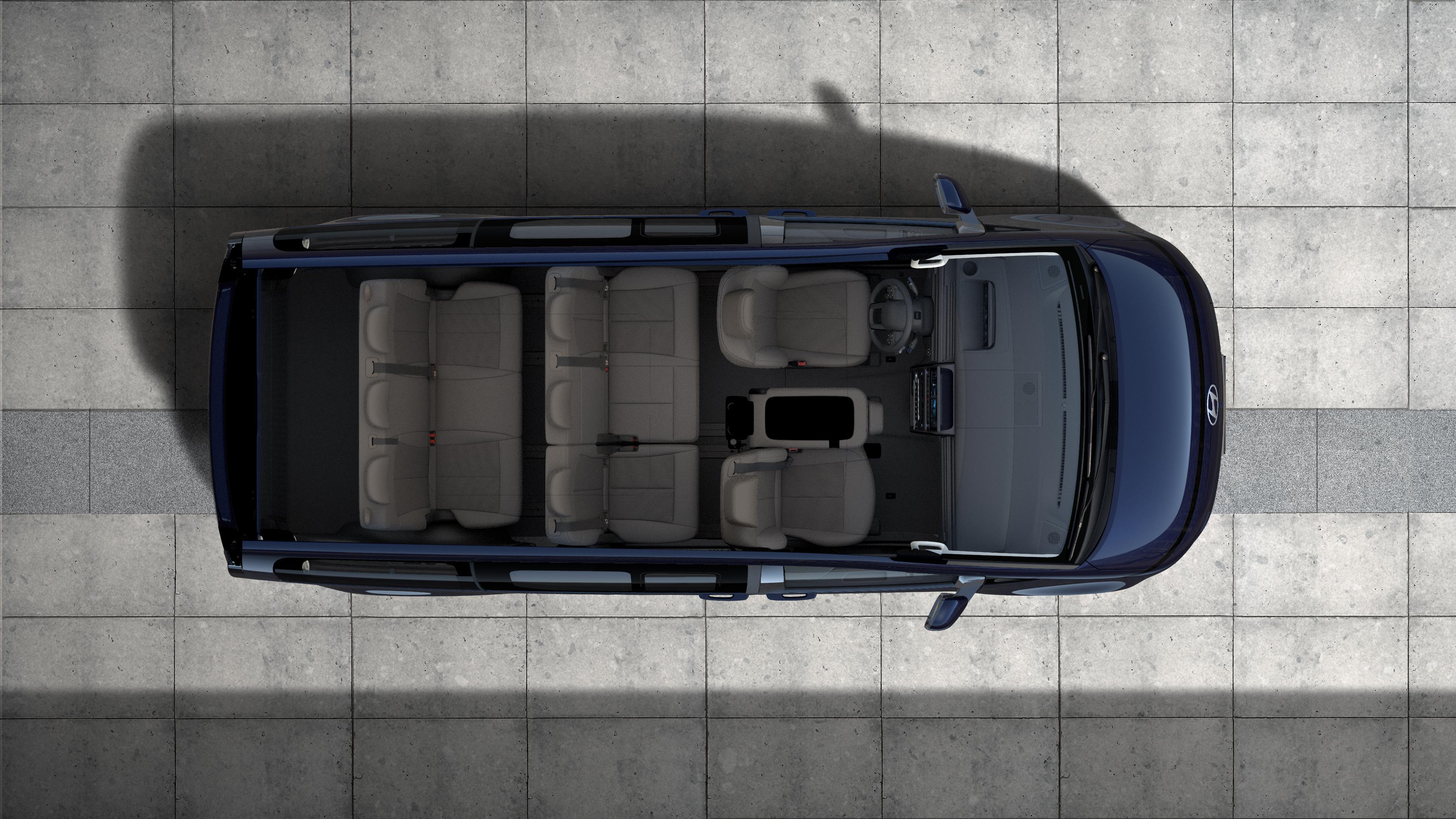 Hyundai STARIA Electric top-down view showing 9-seater layout and spacious interior cabin.